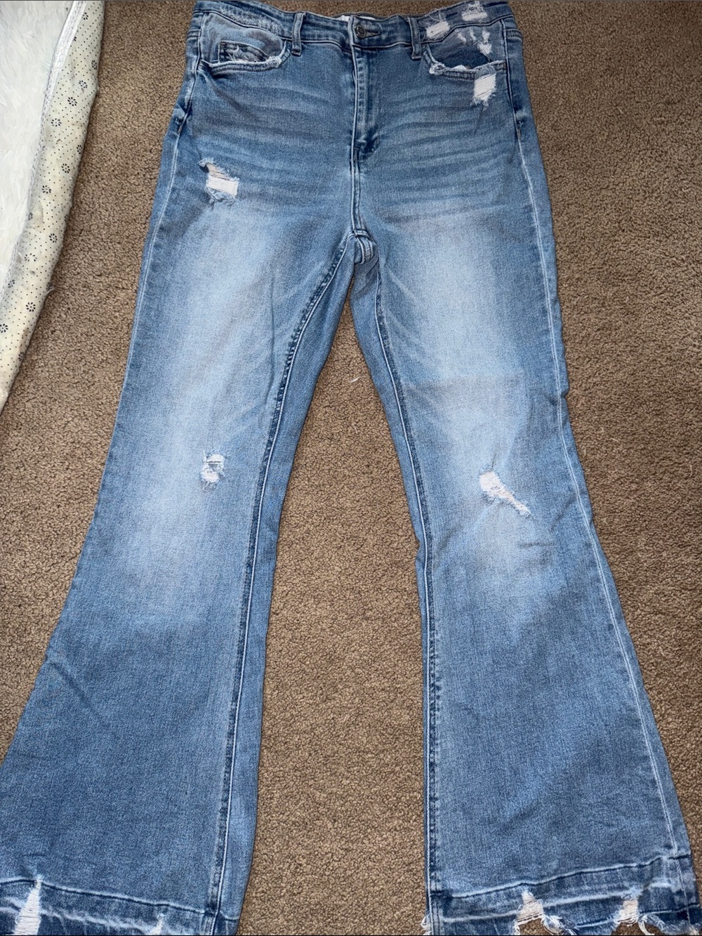 High-Rise Light Blue Distressed Flare Jeans